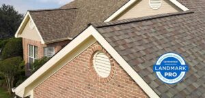 Brown brick house with Certanteed shingles newly installed Certanteed Landmark Pro More than Just a Shingle